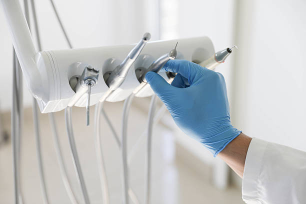Professional Tooth Extraction technician working in Charleston, AR